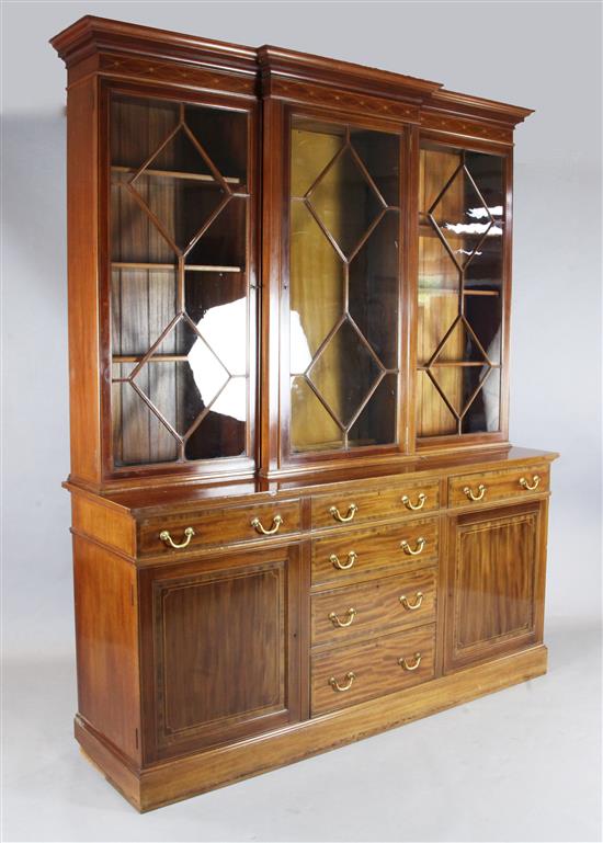 An Edwardian crossbanded mahogany library bookcase, W.6ft 2in. D.1ft 8in. H.7ft 6in.